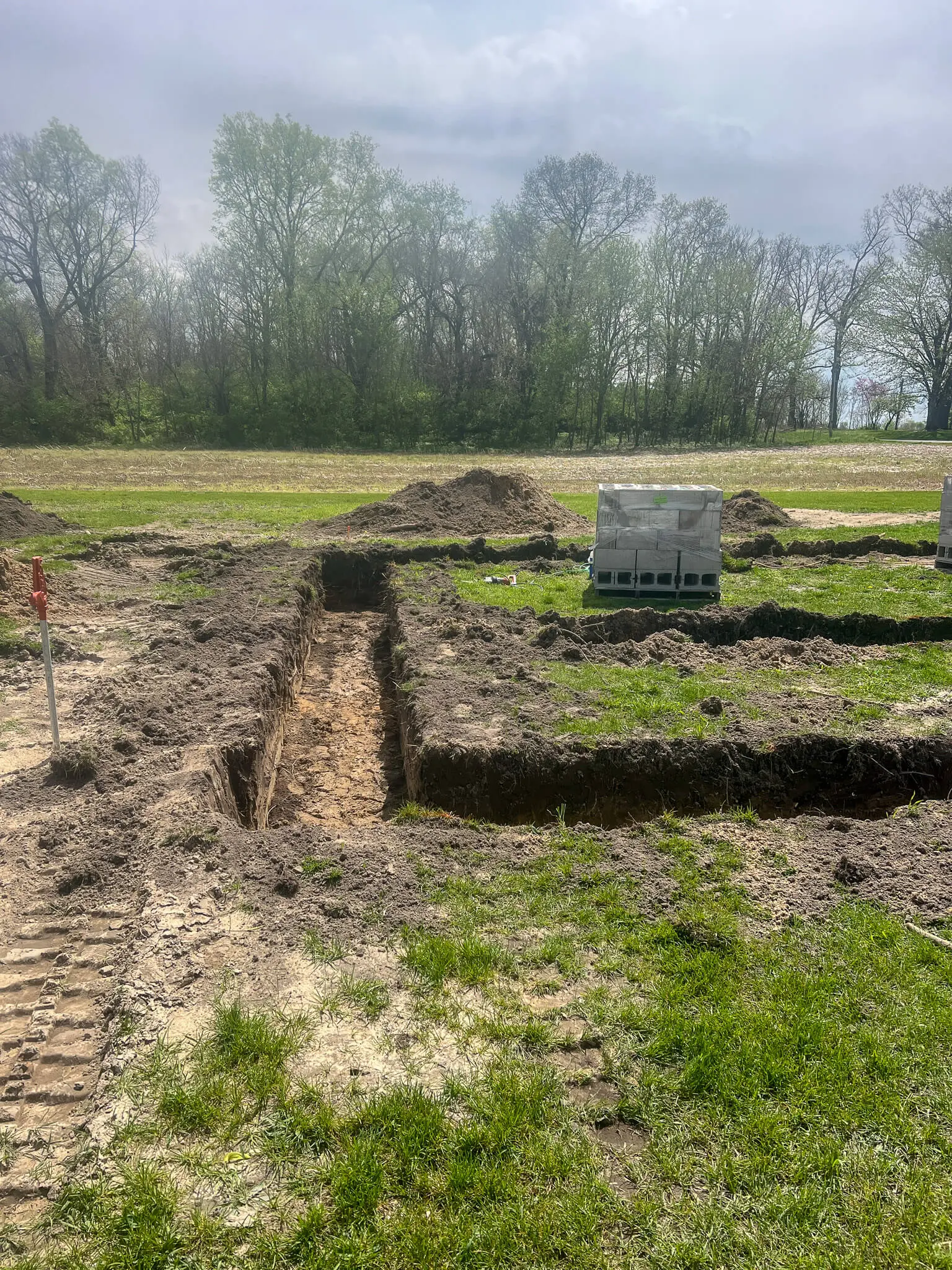 Drain tile trench cut across an open field