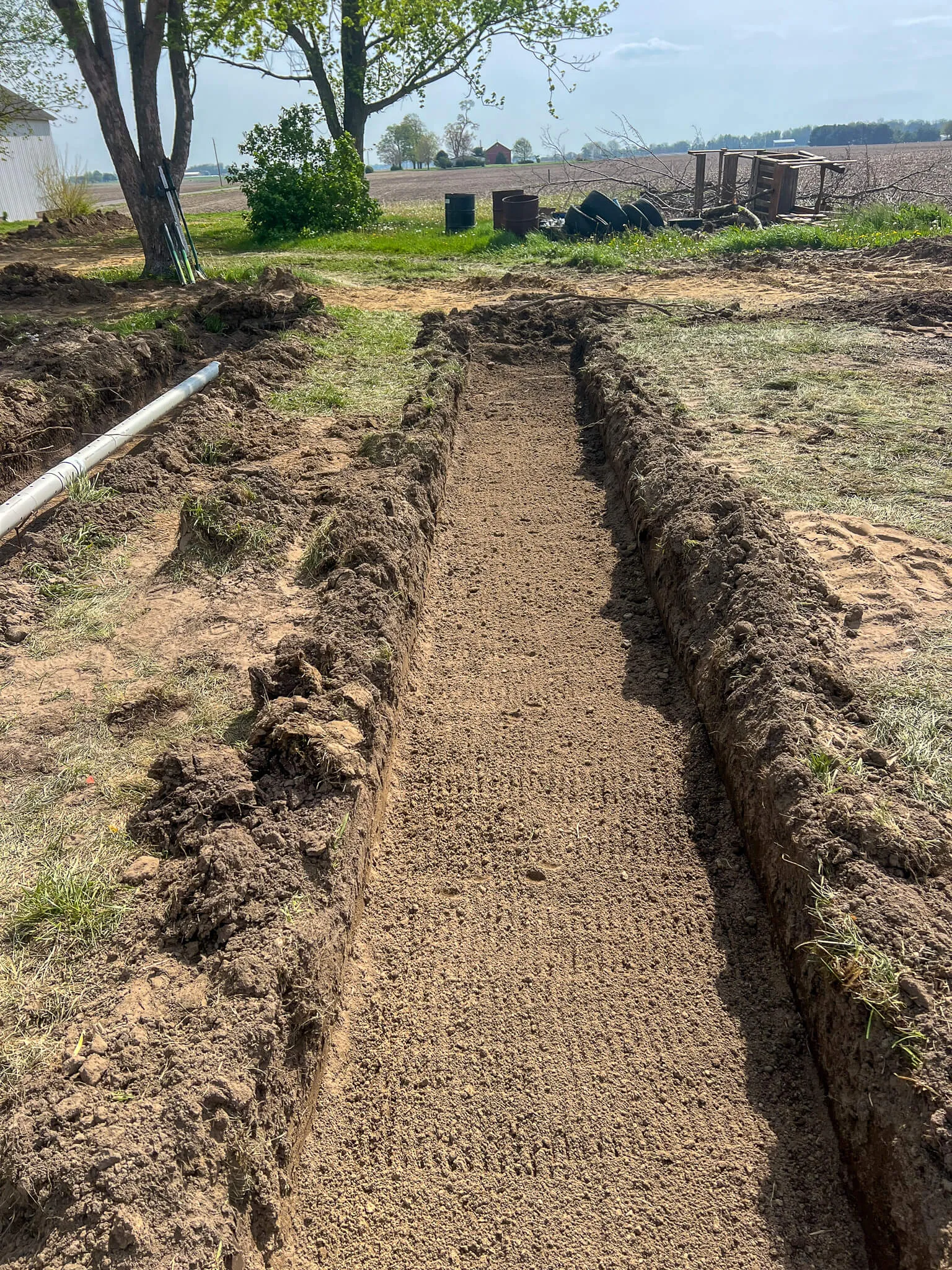 Fresh trench cut for farm tile drainage
